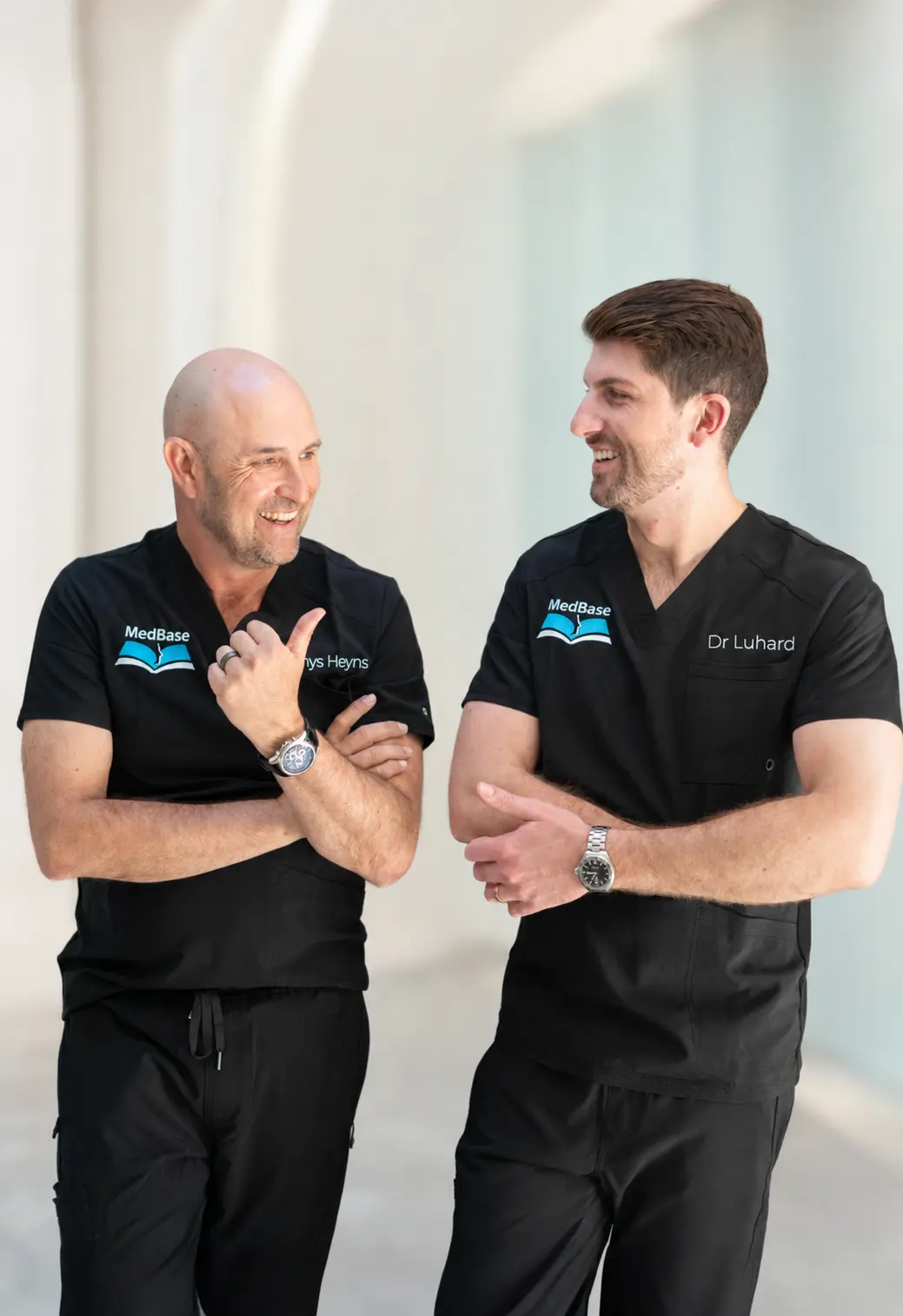 MedBase co-founders Dr Thys Heyns and Dr Luhard with a softly blurred clinical background